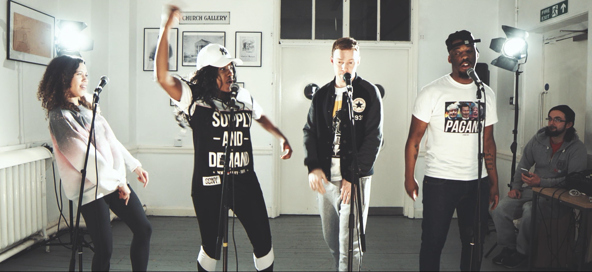 The Shakespeare Project performers at the microphone